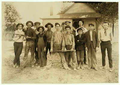 Photograph from 1908: The Ball Team. Composed mainly of glass workers.…