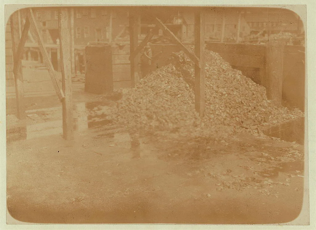 Pile of refuse, waste, and salt water in which these sardine workers…, Maine, 1911