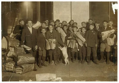 Sunday 5 A.M. Newsies starting out.  Location: Boston, Massachusetts, 1909