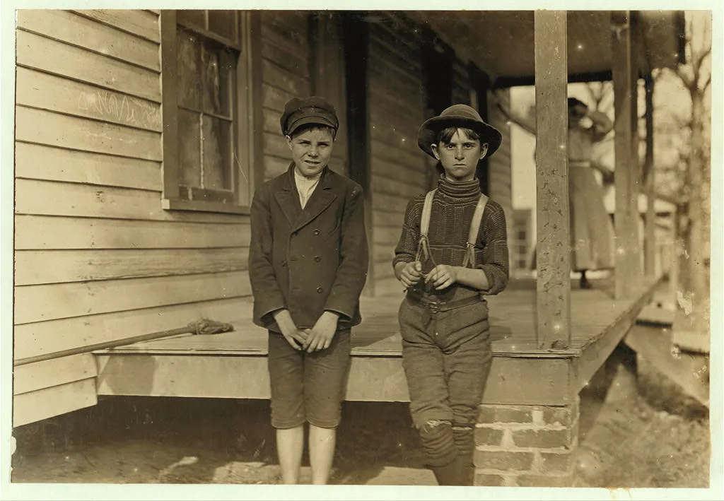 John Lewis (boy with hat) 12 years old. 1 year in mill. Weaver--4…, South Carolina, 1908