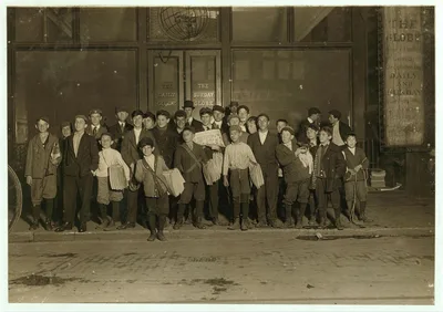 Newsies starting out with Sunday papers, 6 A.M. Location: Boston,…, Massachusetts, 1909