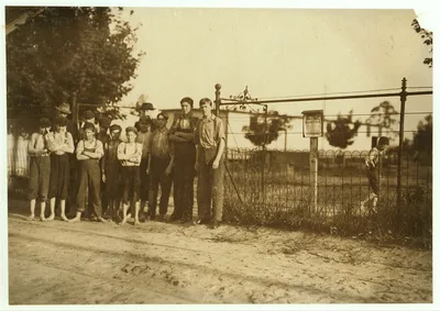 Boys at the gate, and one running off, work in Schoolfield Mills,…, Virginia, 1911