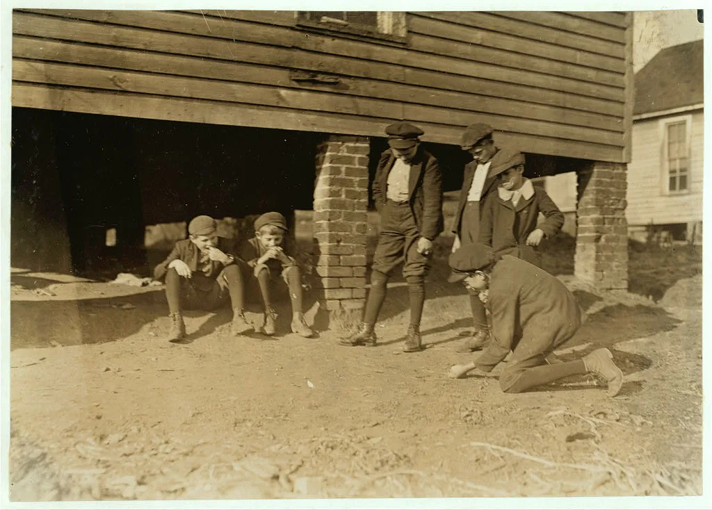 Salisbury, (N.C.) Cotton Mill. A game of marbles. All these boys work…, North Carolina, 1908