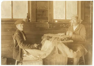 One of the strippers in Tampa, Fla., Cigar factory.  Location: Tampa,…, Florida, 1909