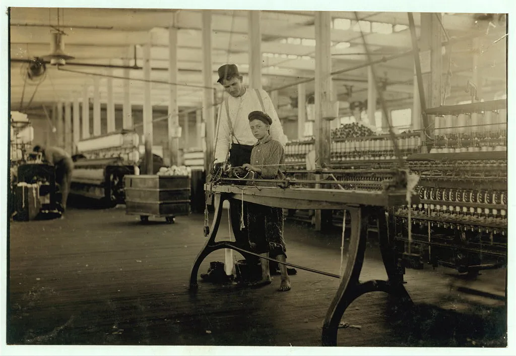 Young "Band-boy" and overseer, Yazoo City Yarn Mills.  Location:…, Mississippi, 1911