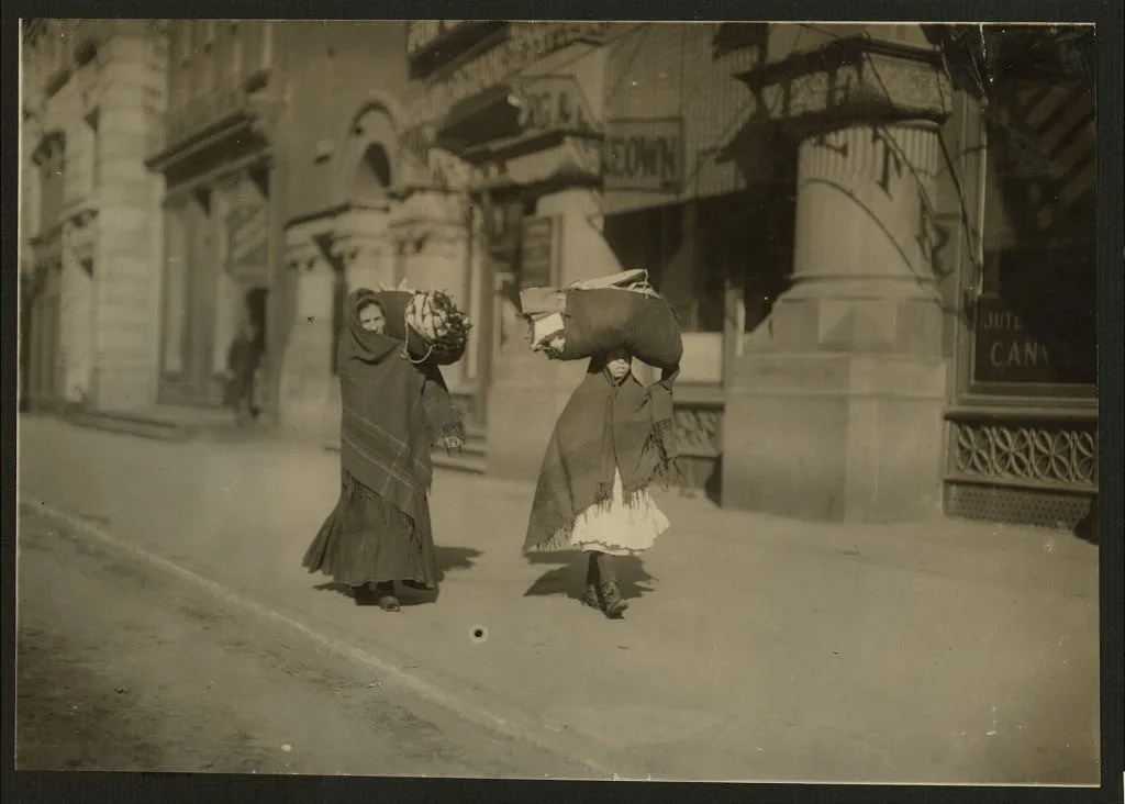 Heavy loads of garments for home-work. Near Bleecker St., N.Y.…, New York (State), 1912