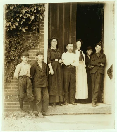 Group working in Holden-Leonard Co., Bennington, Vt. Smallest boy is…, Vermont, 1910