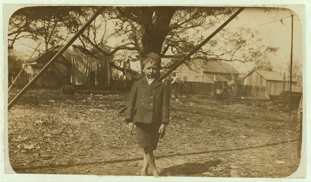 Walter Kitosky, seven year old oyster shucker.  Location: Pass…, Mississippi, 1911
