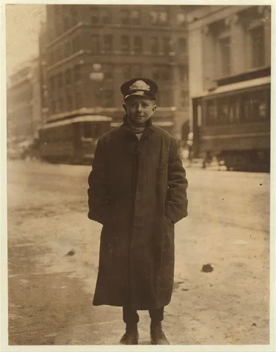 Small messenger on Main Street, 2 P.M. Said he was 14 years old. …, New York (State), 1910