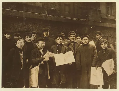 Newsie in paper alley, 4 P.M.  Location: Rochester, New York (State), 1910