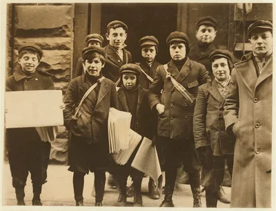 Newsie in Bank Alley waiting for afternoon papers, 4 P.M.  Location:…, New York (State), 1910
