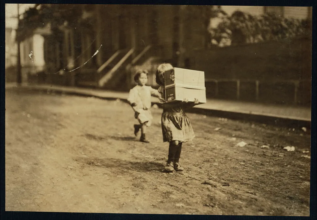Carrying tags. A little tot with a heavy load.  Location: Roxbury,…, Massachusetts, 1912