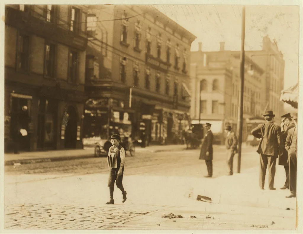 One of the kids after school.  Location: St. Louis, Missouri, 1910