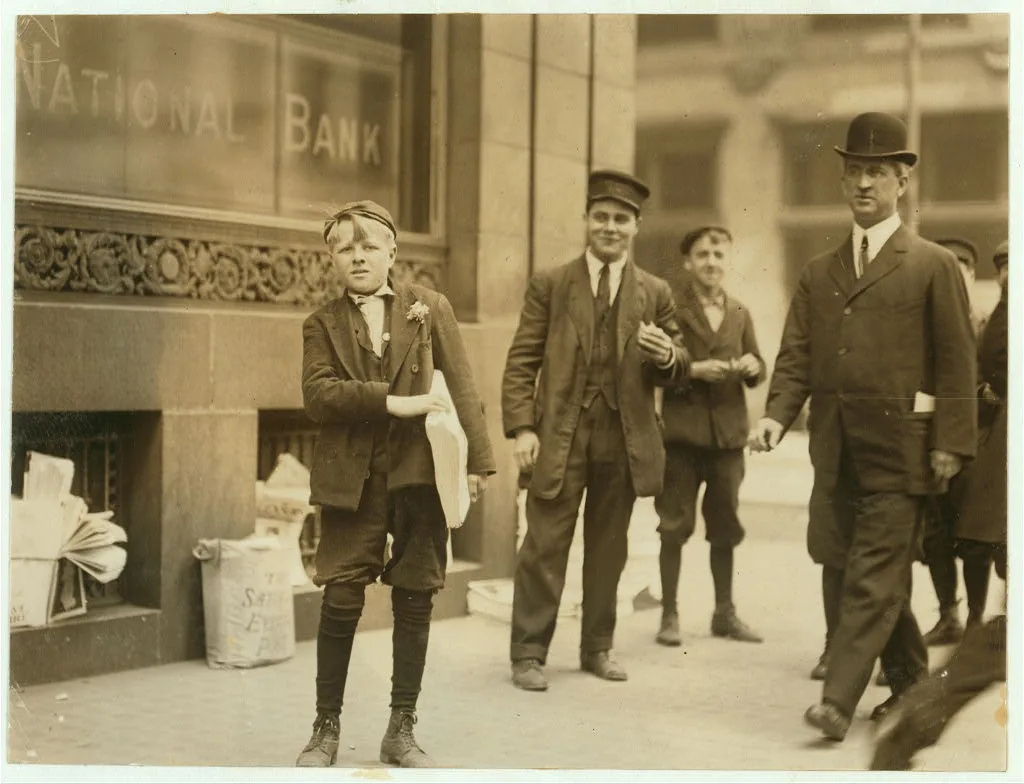 Truant newsboy, Broadway and Locust Sts. 11 A.M.  Location: St.…, Missouri, 1910