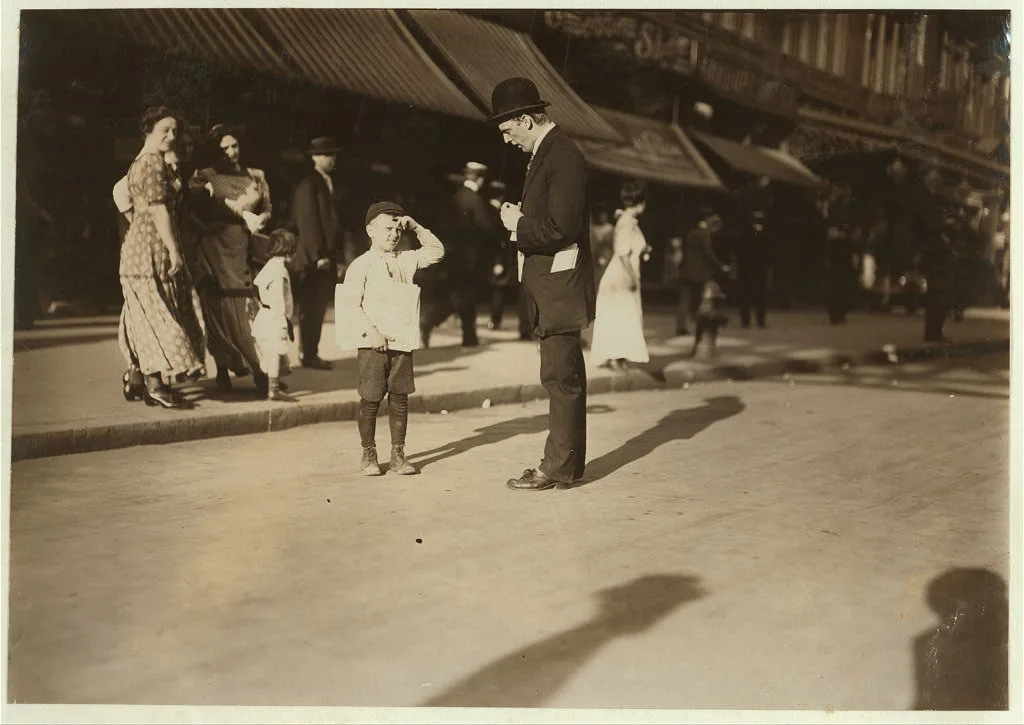 "Newsie" 125th St.  Location: New York, New York (State), 1910