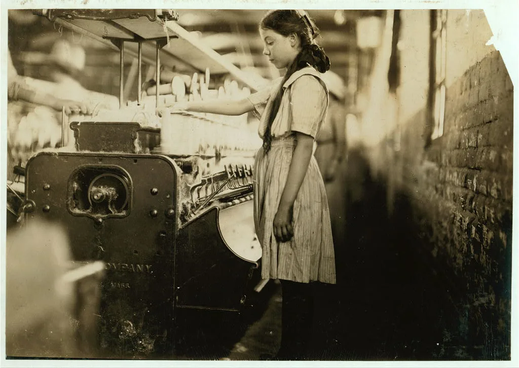 A young spooler in Roanoke (Va.) Cotton Mills.  Location: Roanoke,…, Virginia, 1911
