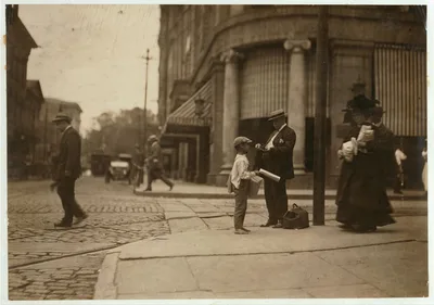 10 year old newsie. Note absence of badge or indication of…, Massachusetts, 1911