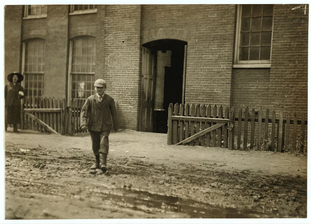 Young worker leaving mill of Sagamore Manufacturing Company, Fall…, Massachusetts, 1911