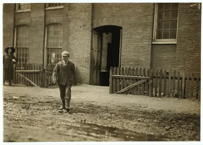 Young worker leaving mill of Sagamore Manufacturing Company, Fall…, Massachusetts, 1911