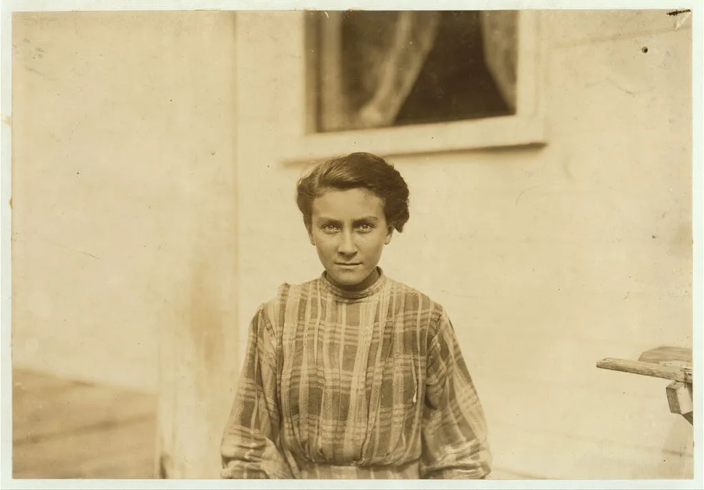 A modest young French girl of 13 years. Spinner in the Spring Village…, Massachusetts, 1911