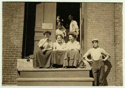 In doorway is Mary Deschene, 11 years old. Helper in Glenallen Mill. …, Massachusetts, 1911