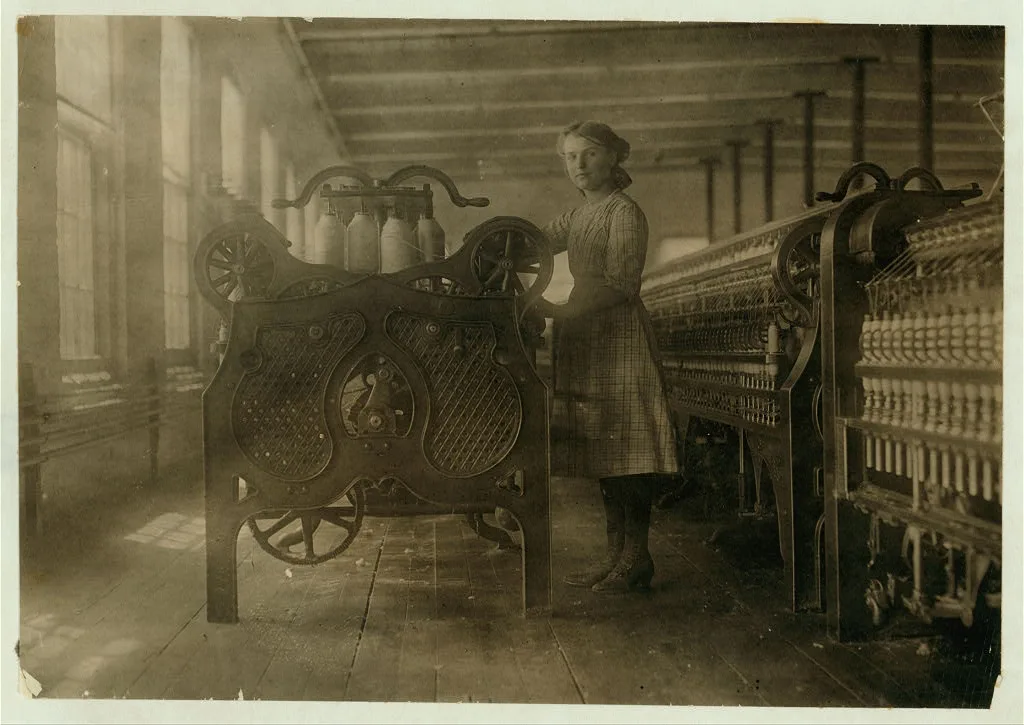 Annie Dugas, spinner at machine on top floor of Glenallen Mill. …, Massachusetts, 1911