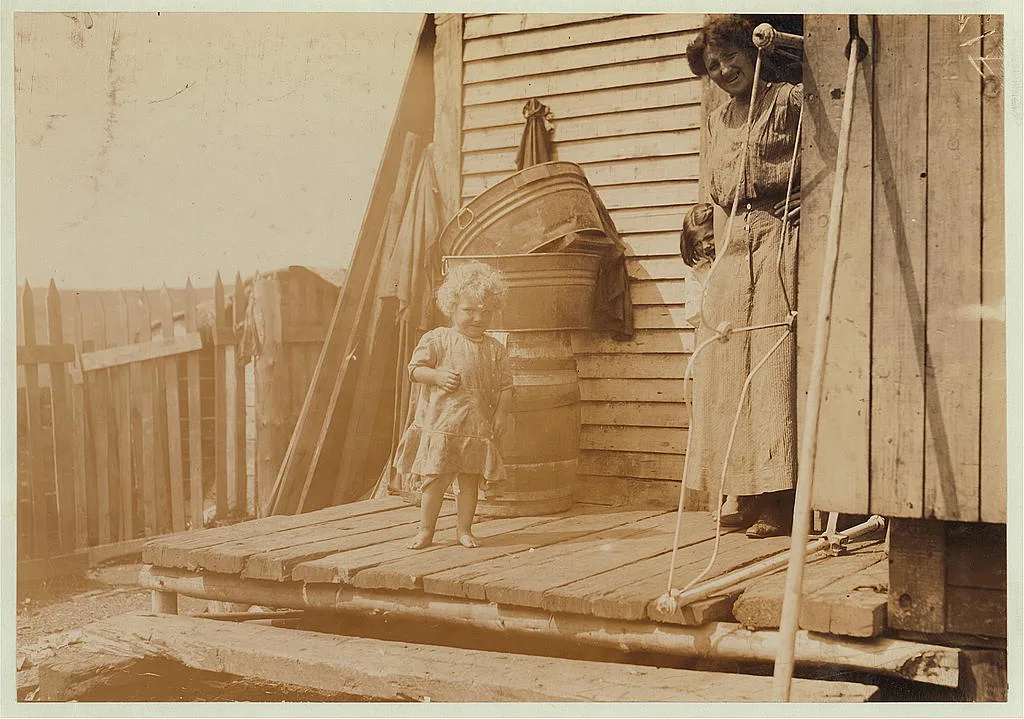 A prospective sardine worker, one of the Goodell family. (See Photo…, Maine, 1911
