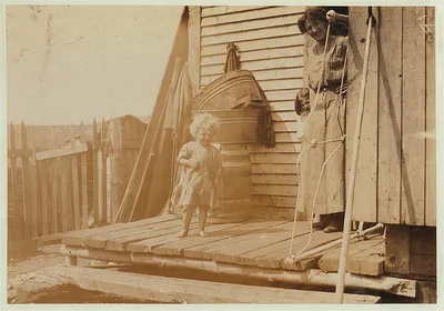 A prospective sardine worker, one of the Goodell family. (See Photo…, Maine, 1911