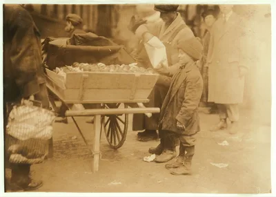 Selling oranges at market.  Location: Boston, Massachusetts, 1917