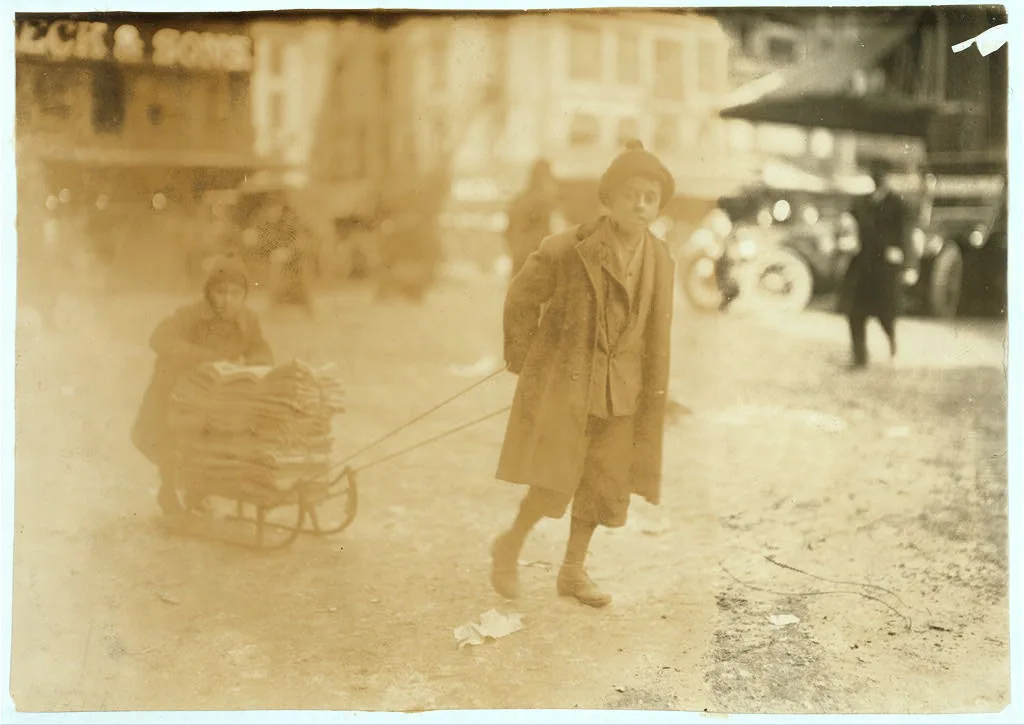 Taking bags home to be mended. 5 to 11 years old. Market.  Location:…, Massachusetts, 1917