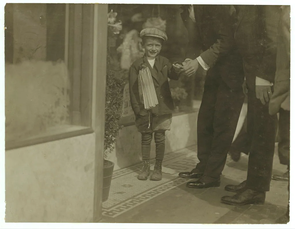 A "drunk" buying the stock of a 6 year old newsboy. See California…, 1915
