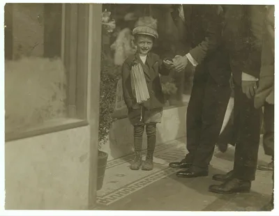 A "drunk" buying the stock of a 6 year old newsboy. See California…, 1915