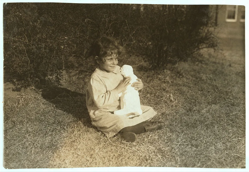 Blind child making the acquaintance of a bit of statuary at Oklahoma…, 1917