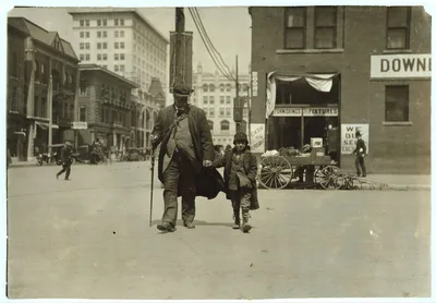 Blind man and his youthful guide.  Location: Oklahoma City, Oklahoma, 1917
