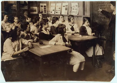 [Continuation School group at Ipswich Mills, South Boston, studying…, Massachusetts, 1917